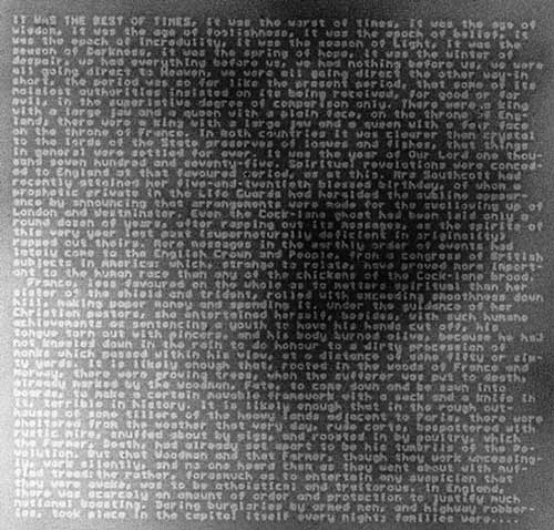 The first page of A Tale of Two Cities miniaturized on a pinhead